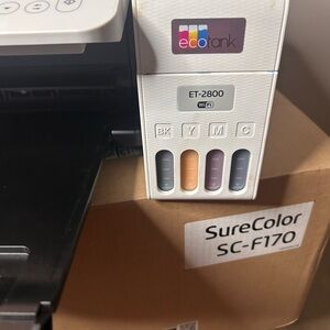 Epson EcoTank ET-2800 White Printer with Visible Cyan Magenta Yellow Black Tanks
